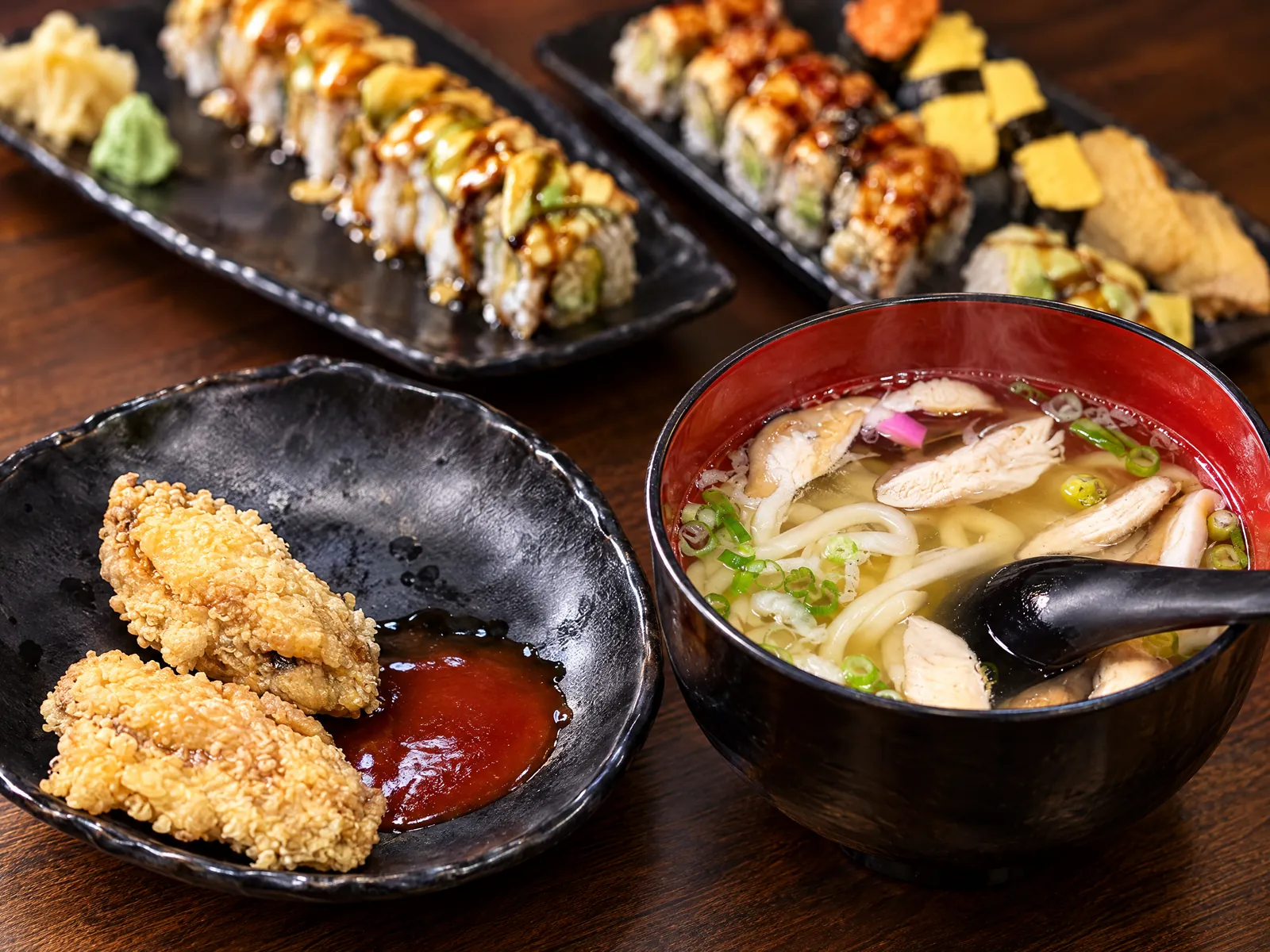 Tempura with dipping sauce and udon soup at Kikoo Sushi East Village